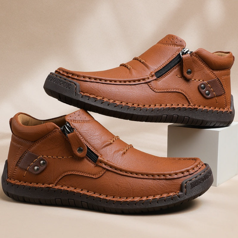 Solemarket | Retro-elegante slip-on herrestøvler i læderstil